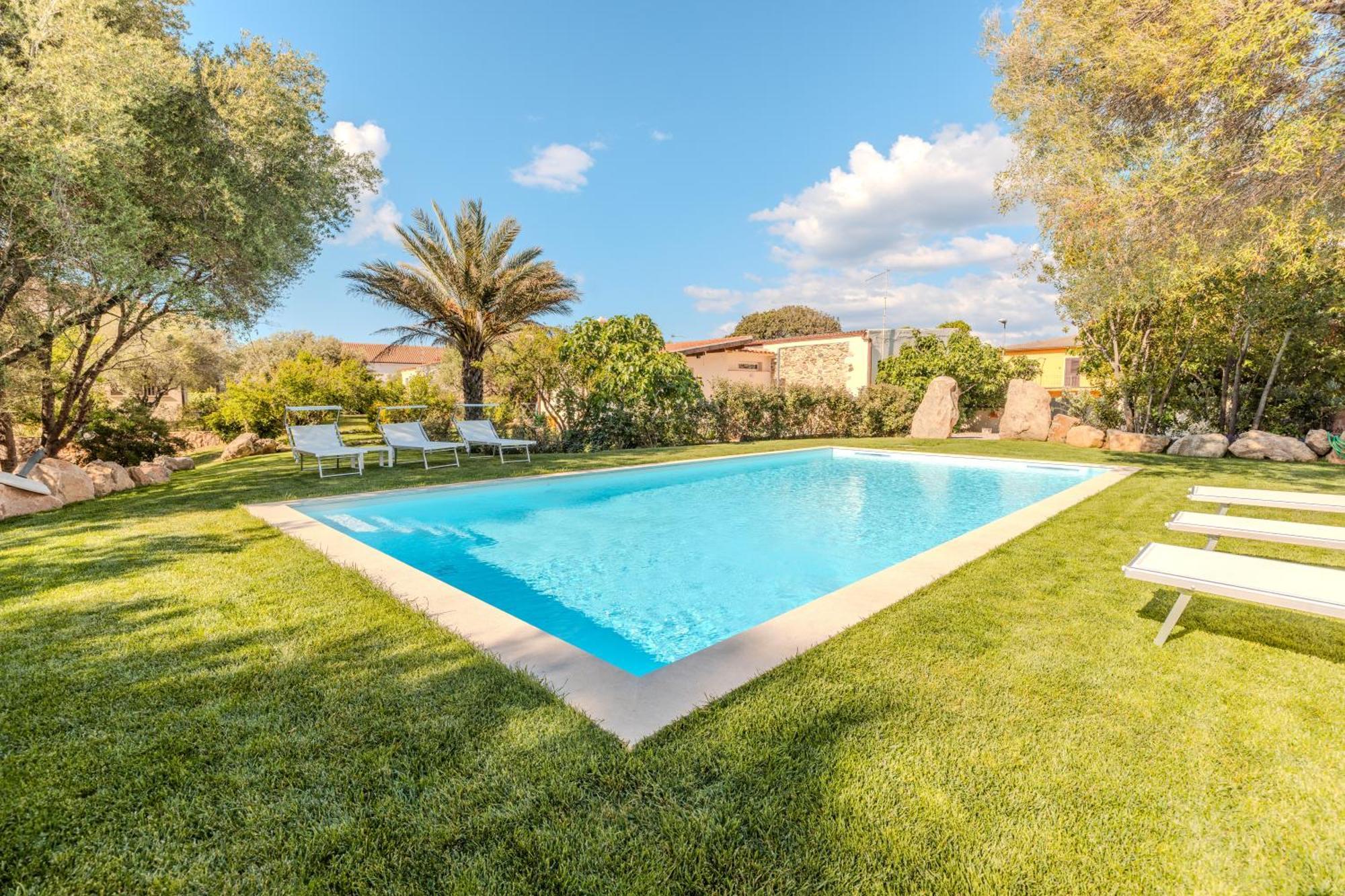 Apartamento Stazzo San Teodoro Piscina Condivisa Exterior foto