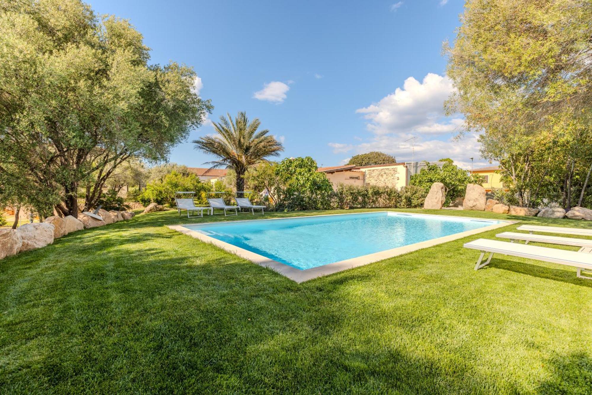 Apartamento Stazzo San Teodoro Piscina Condivisa Exterior foto