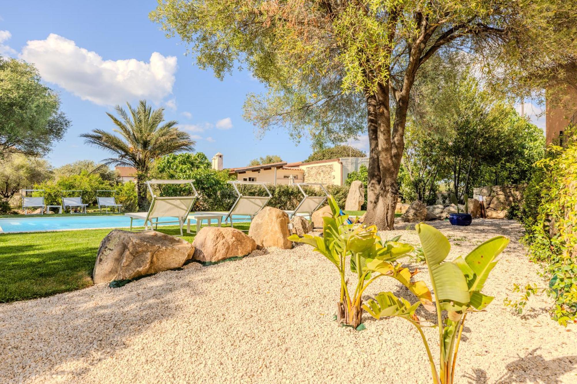 Apartamento Stazzo San Teodoro Piscina Condivisa Exterior foto